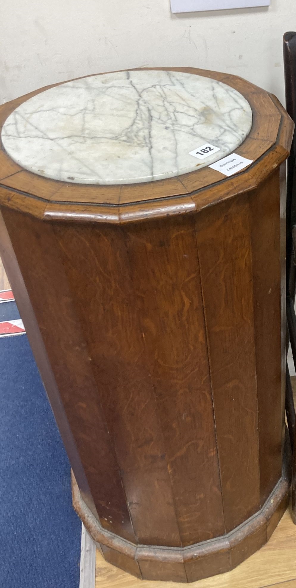 A Victorian oak marble top cylinder bedside cabinet, diameter 40cm height 77cm